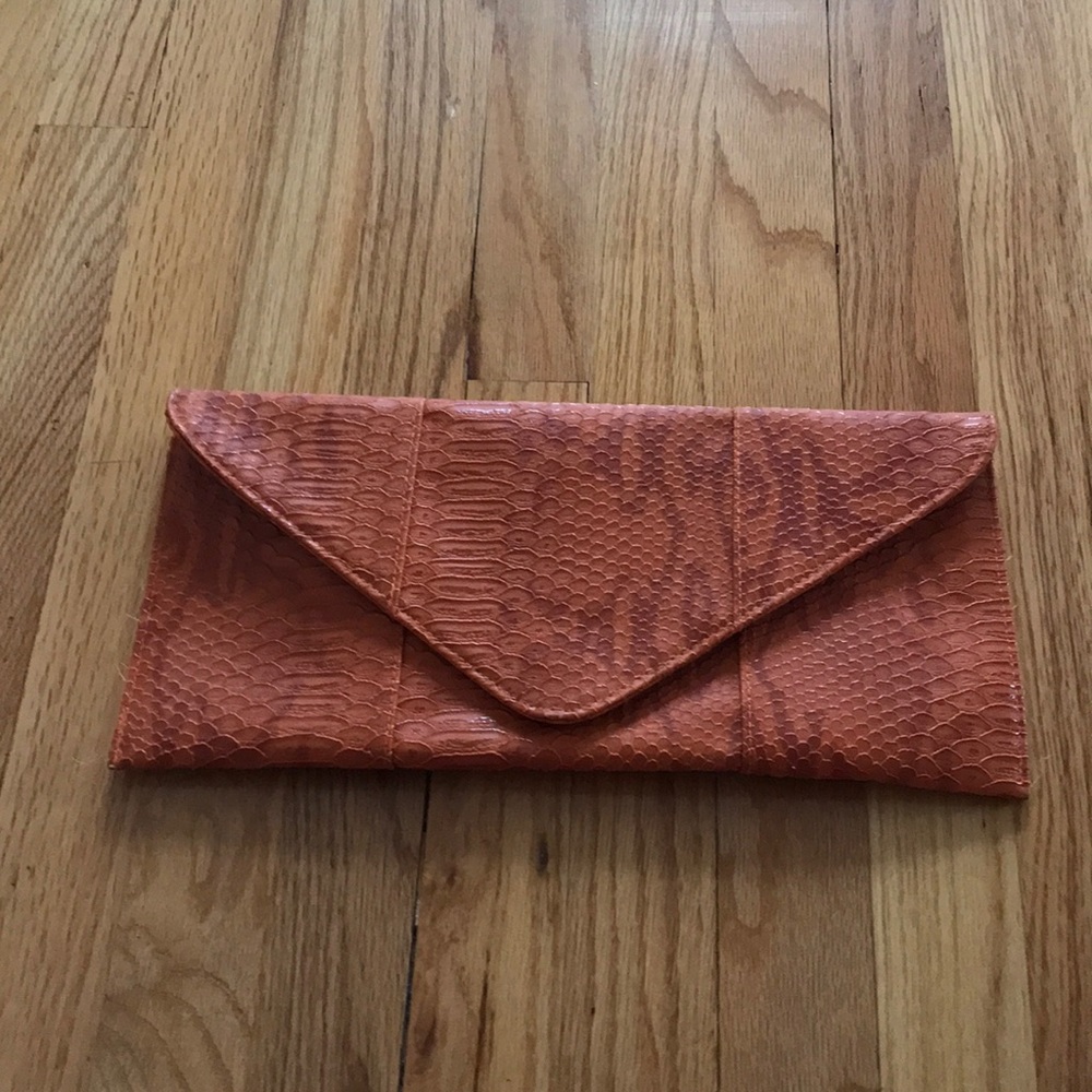 Snake skin clutch